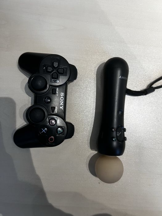 Геймпад на PS 3 и три диска с играми