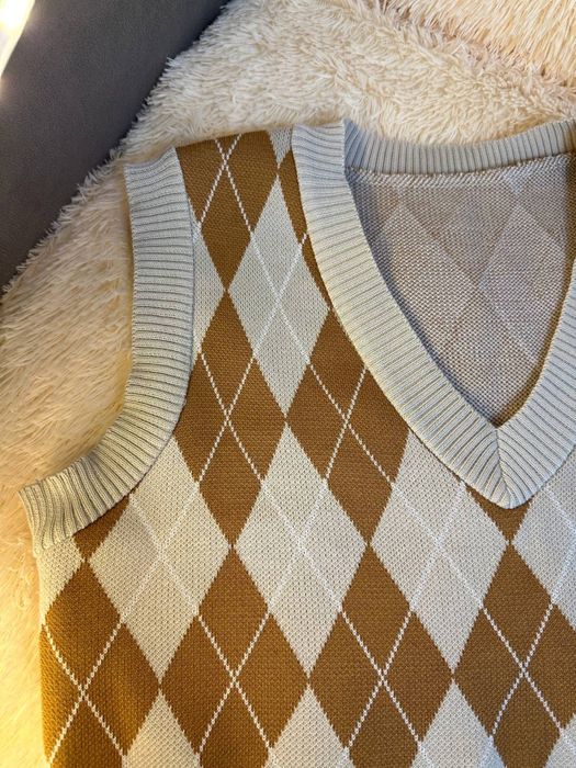 короткая жилетка