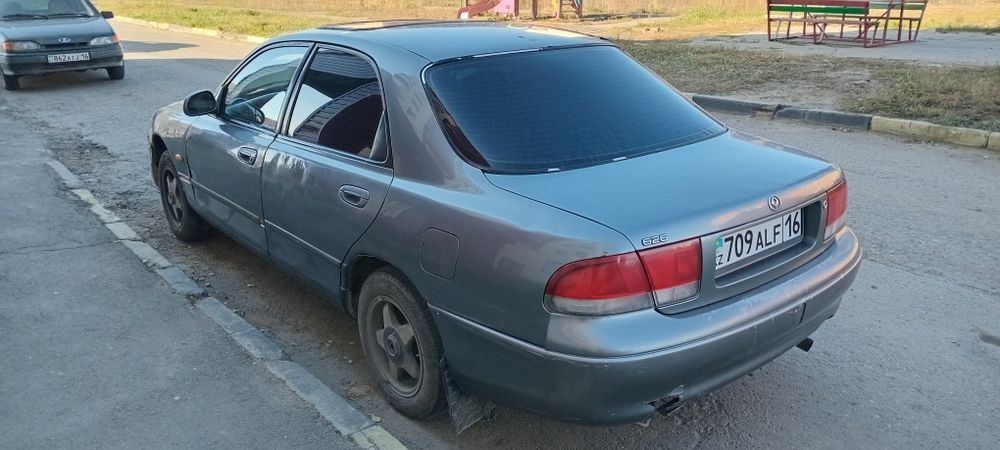 Мазда кронус 92..