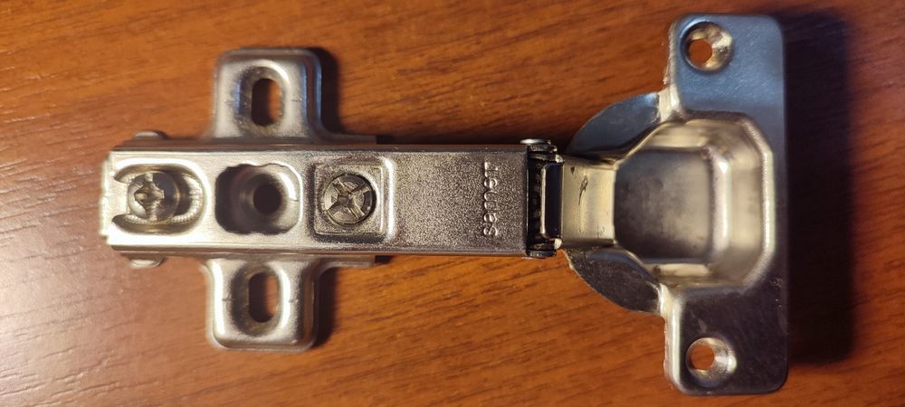 Петли мебельные "Star" с обратной пружиной.