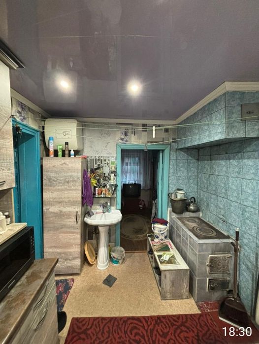 Два дома на одной ограде