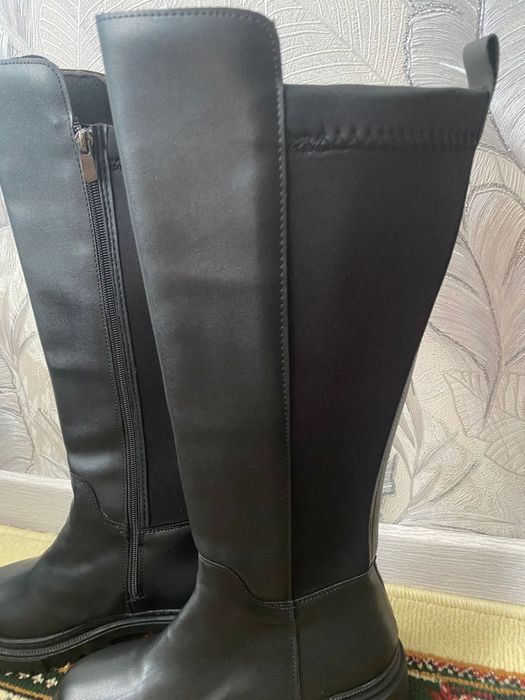 Длинные сапоги новый