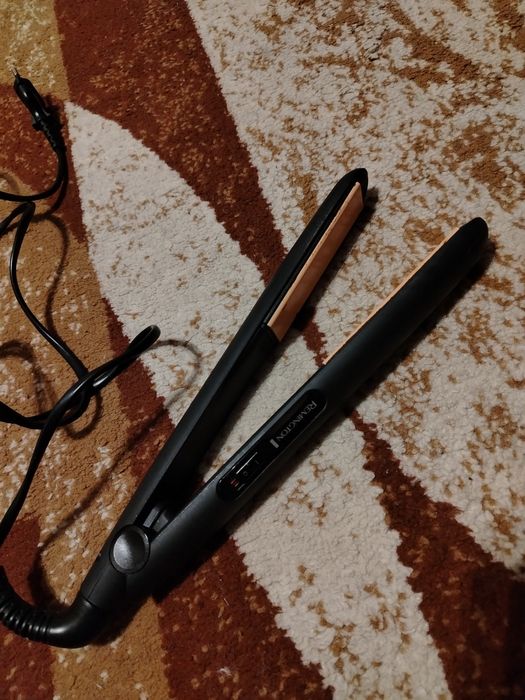 Vând placa de par Remington