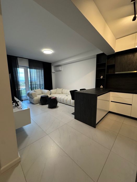 Chirie apartament 2 camere + living, cu loc de parcare, in bloc nou