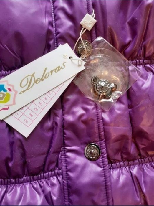 Пуховик новый за 7000 тенге