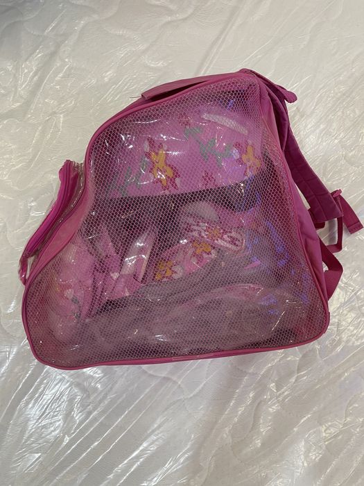 Роликовые коньки