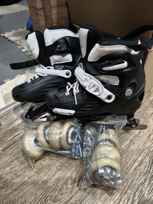Продам коньки - ролики 2 в 1