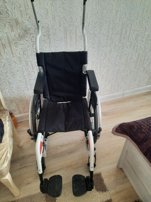Детская инвалидная коляска