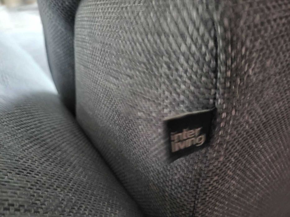 Сив ъглов диван от плат "HUKLA Interliving" с ел. релакс механизъм