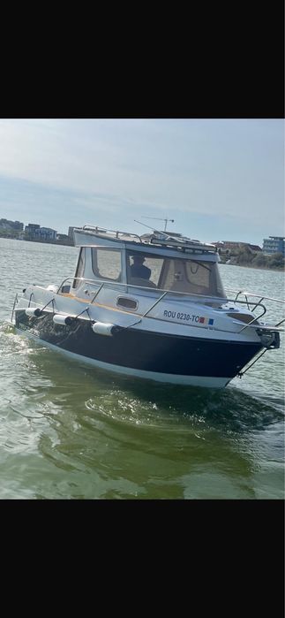 Ambarcatiune Pegazus 550 cabinata; motor honda 150;