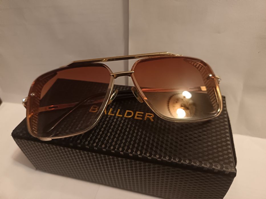 Дизайнерски слънчеви очила