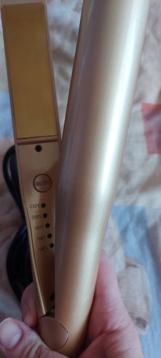 Преса за  къдрене на коса.