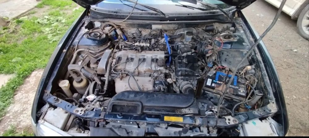 Мазда Кронос 1.8