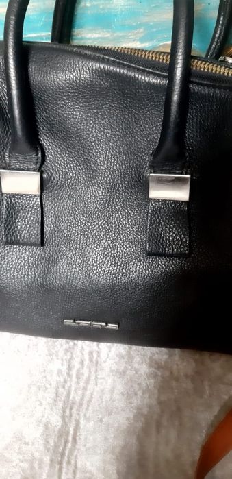 Сумки и рюкзак кожаные