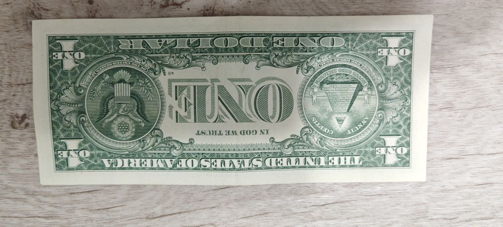 Продаю один доллар