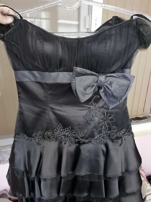 дизайнерска рокля