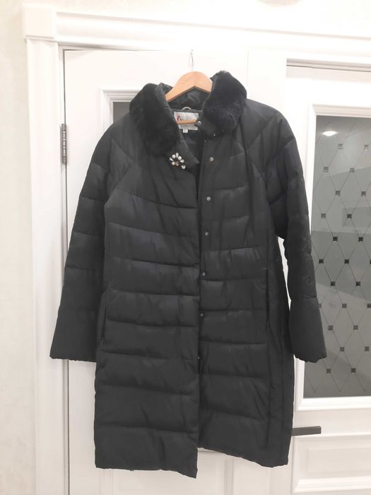 Продам женский пуховик