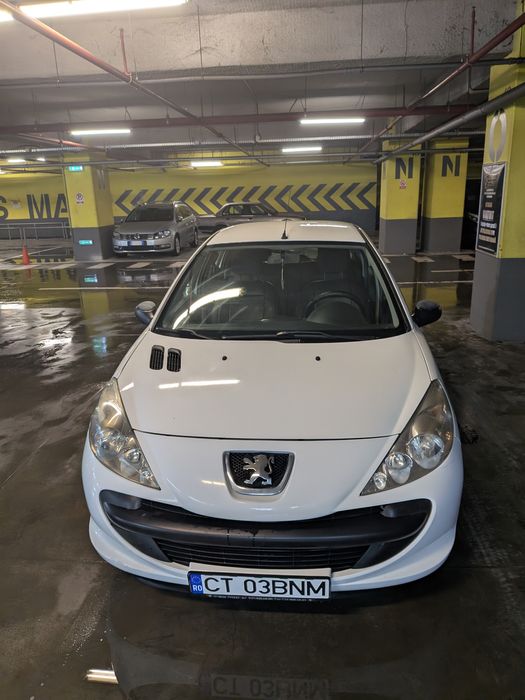 Peugeot 206+ aer conditionat ,geamuri electrice fata
