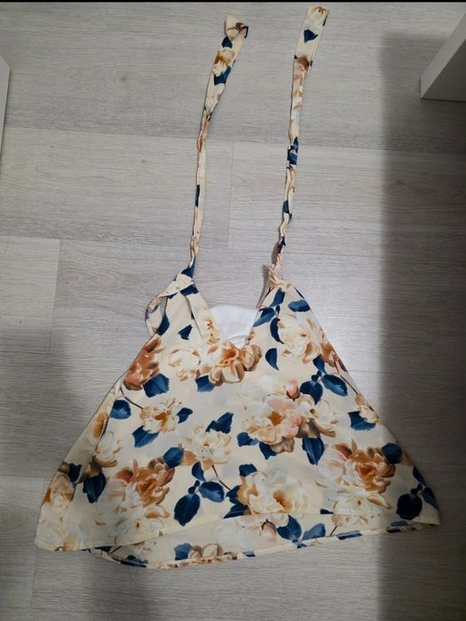 Top de vara oferta in descriere