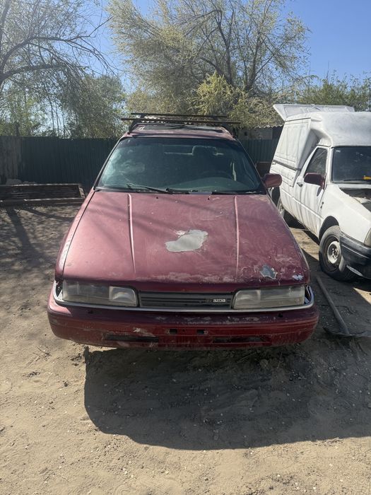 Легковые автомобили Мазда 626