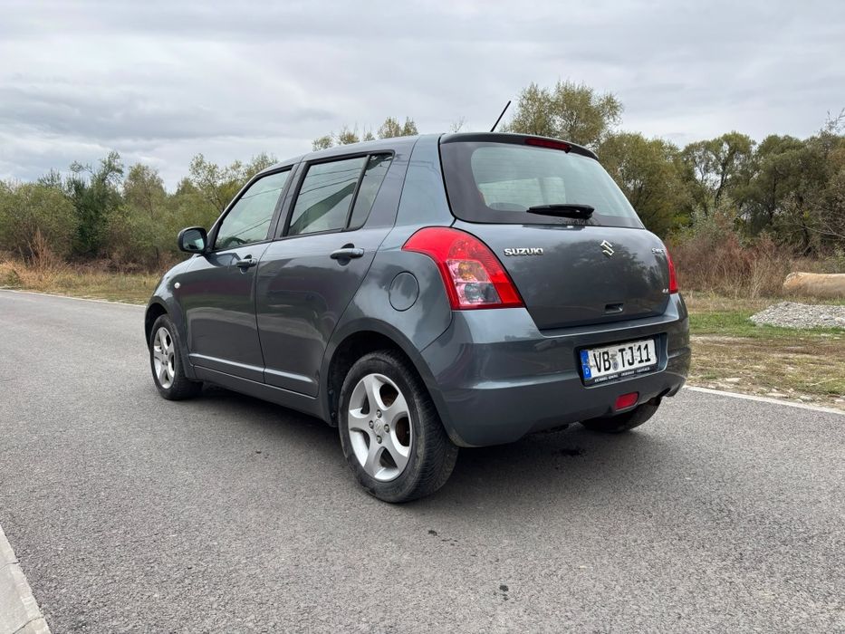 Suzuki Swift 4x4 //  1.3 benzină 2009