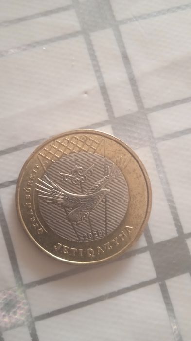 Продам манету 100