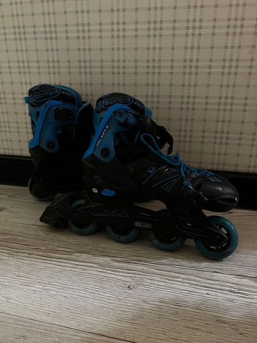 Роликовые коньки