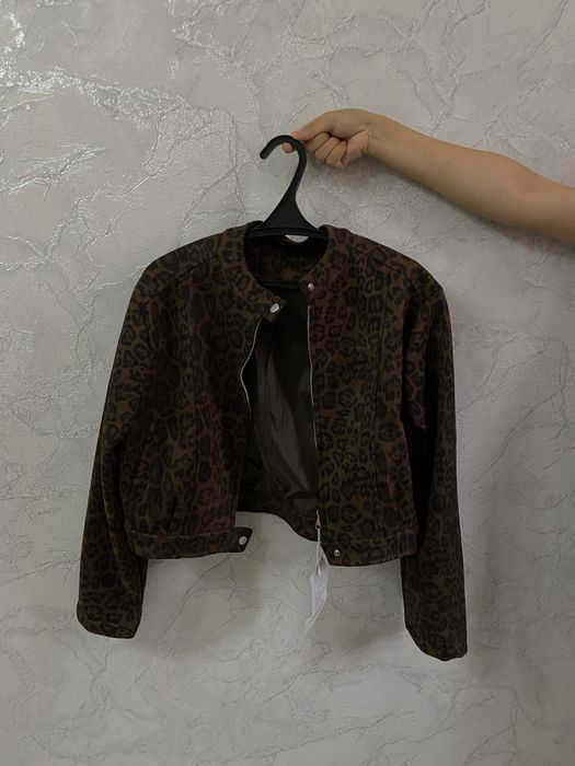 Leopard print suede jacket.