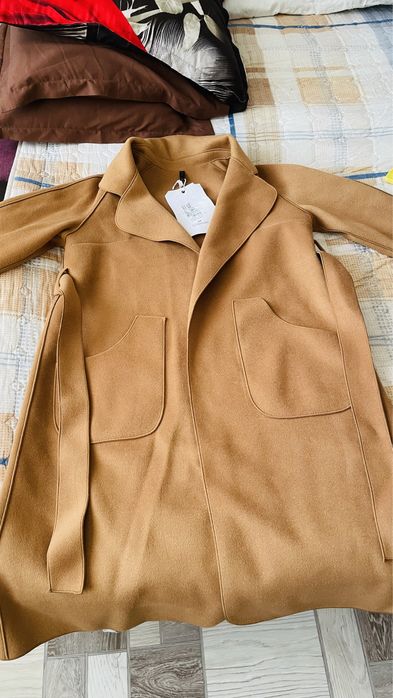 Новая пальто