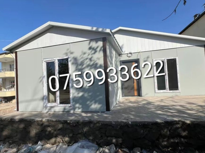 Case din structură metalică învelite cu panou sandwich