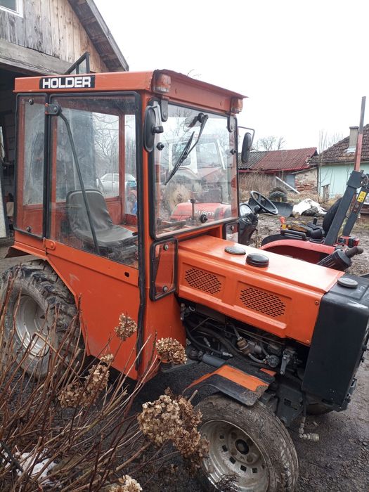 Tractoras Holder