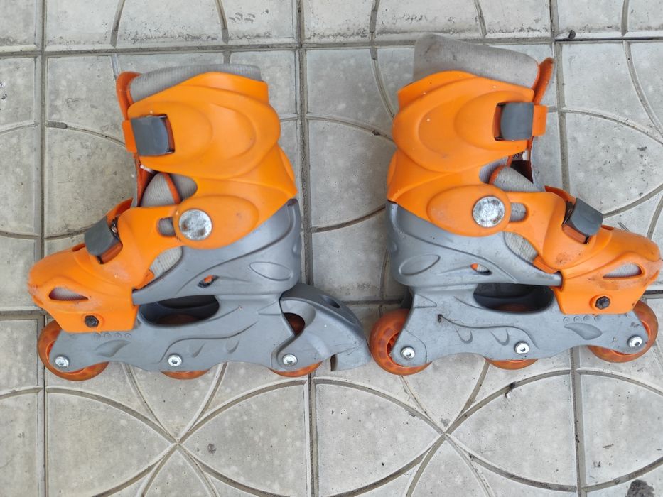 Коньки роликовые