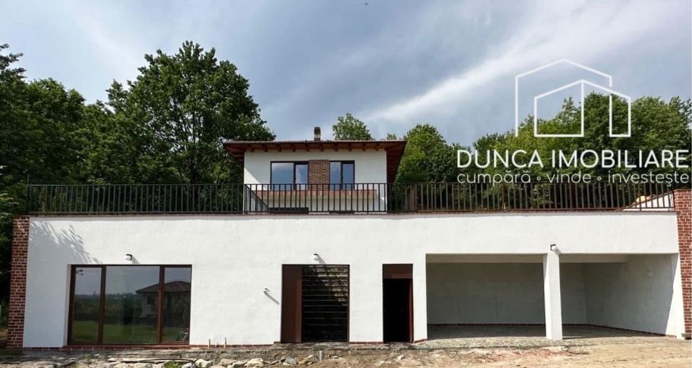 Casă finisată 130 mp+ anexă 35 mp+ 2 garaje mari+ 500 mp teren