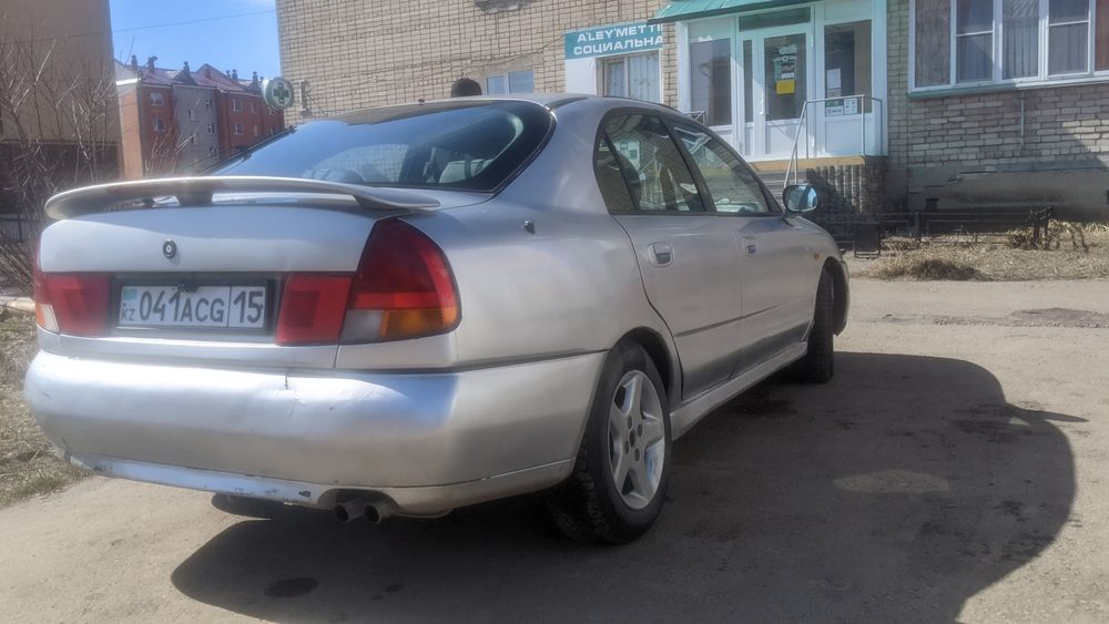 Митсубиши каризма