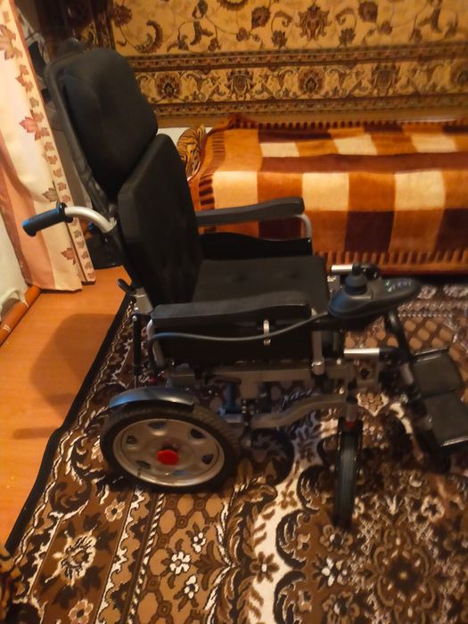 Электронная инвалидная коляска
