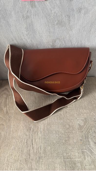 Продам сумочки  и рюкзак новые