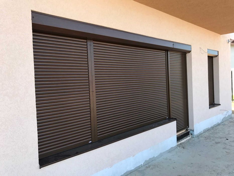 RULOURI Aluminiu si Usi de garaj rezidentiale SECTIONALE