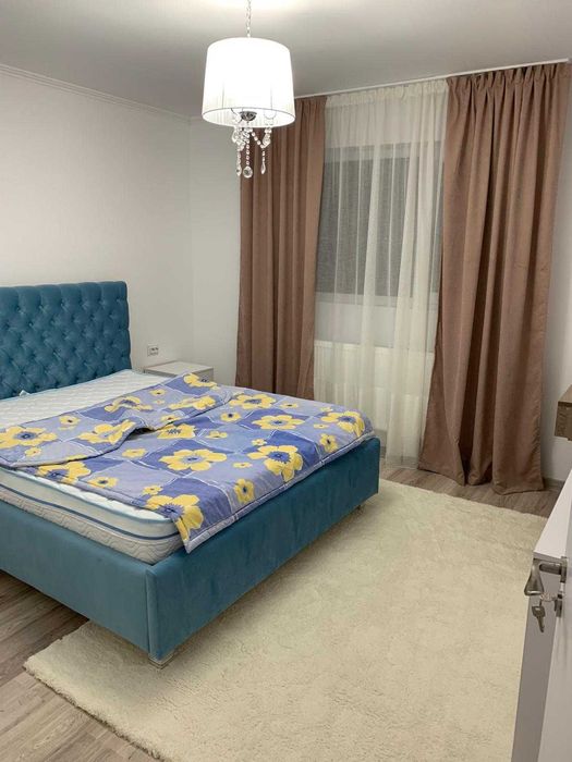 Inchiriez  Apartament modern ultracentral 2 camere + parcare privată
