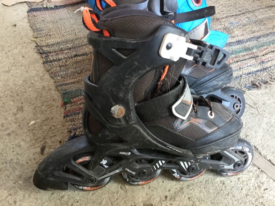 Salopeta lucru marime 52 ,rosu 45ron si role oxelo mar