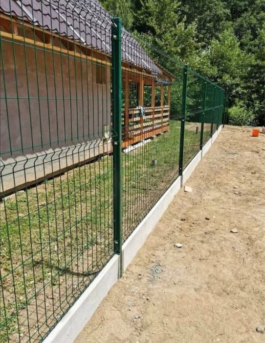 Executam garduri si porti