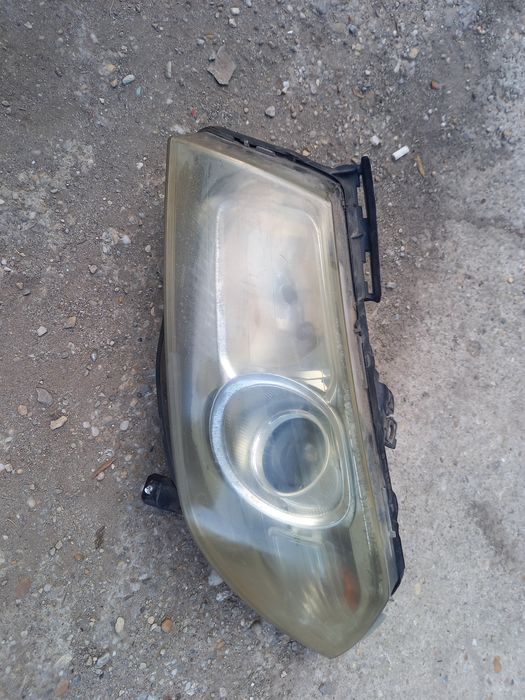 Far stanga Megane 2 facelift cu lupa și halogen