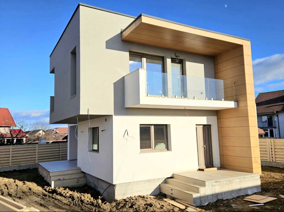 Casă modernă exclusivistă 
, fațadă ventilată HPL 
Varianta Craiovei