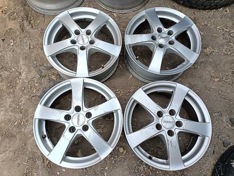 Продам оригинальные легкосплавные диски "Dezent" на Toyota Carina