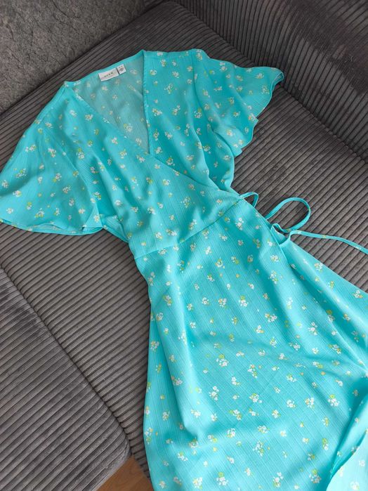 Рокля с прехлупване