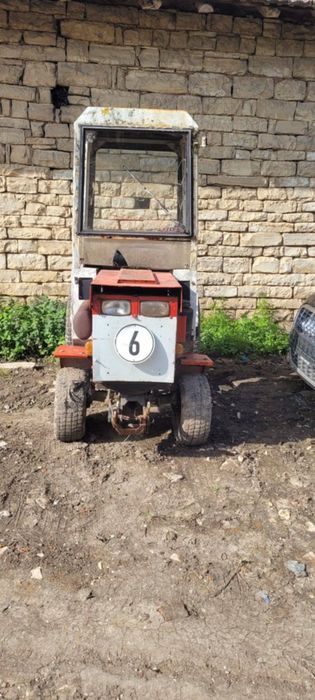 Трактор със косачка