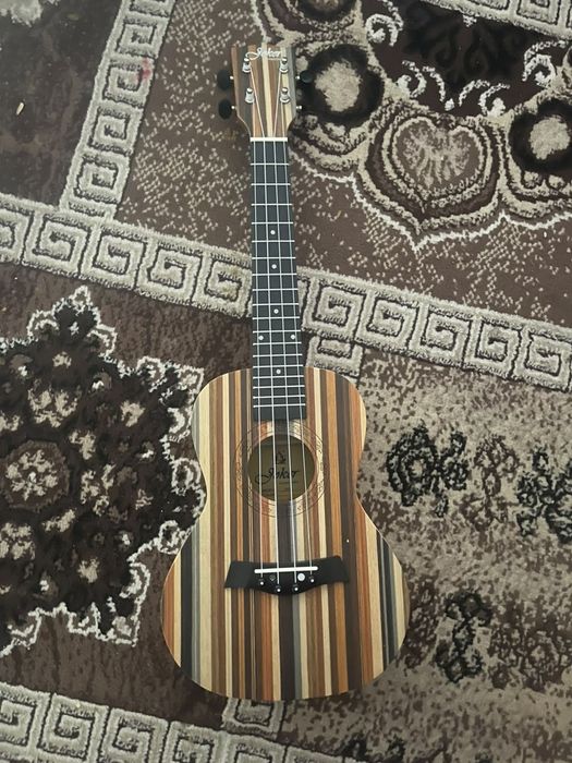 Укулеле совсем новый, не давно куплен