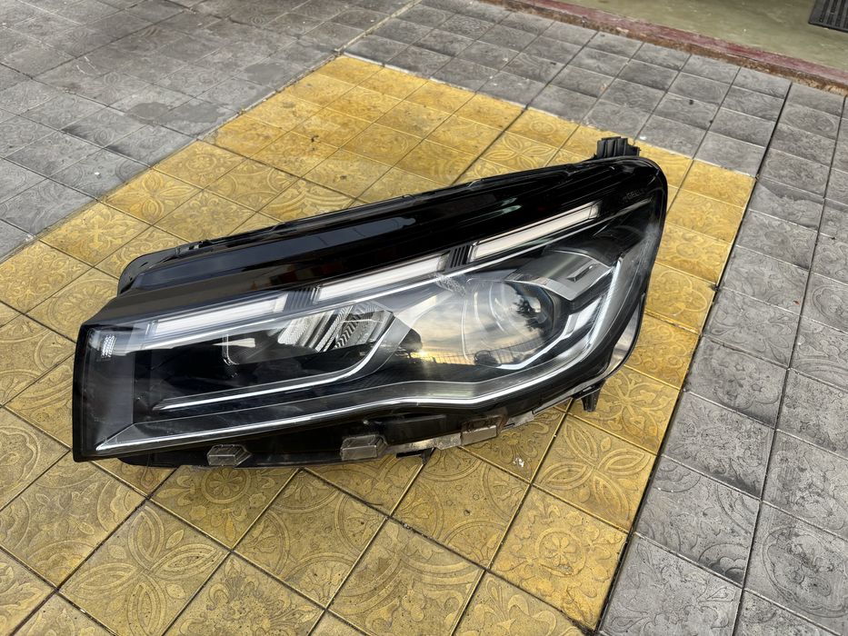 Фара Geely Emgrand