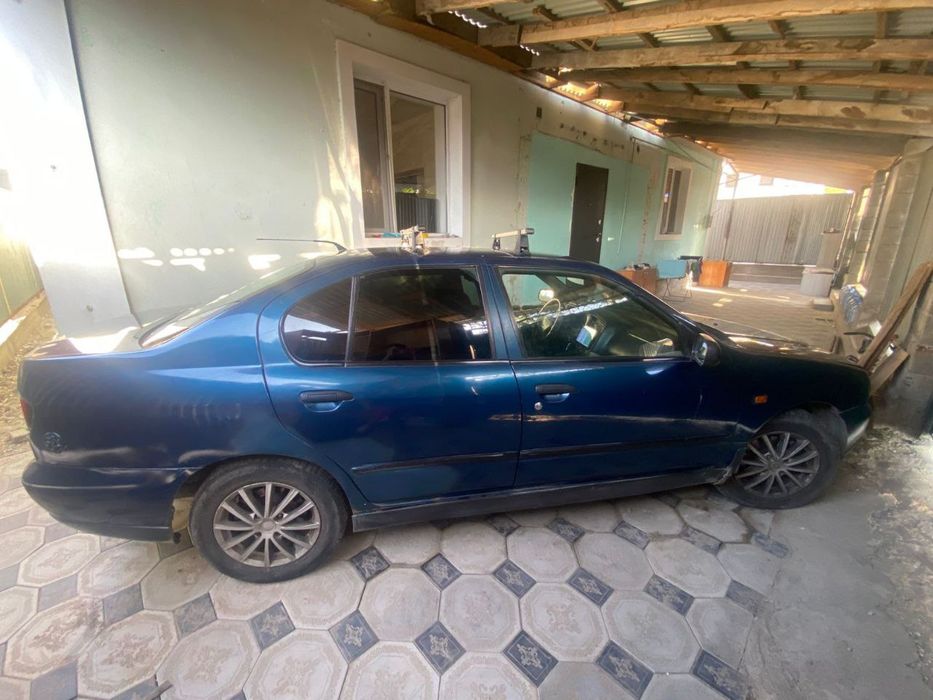 Nissan примера Р11