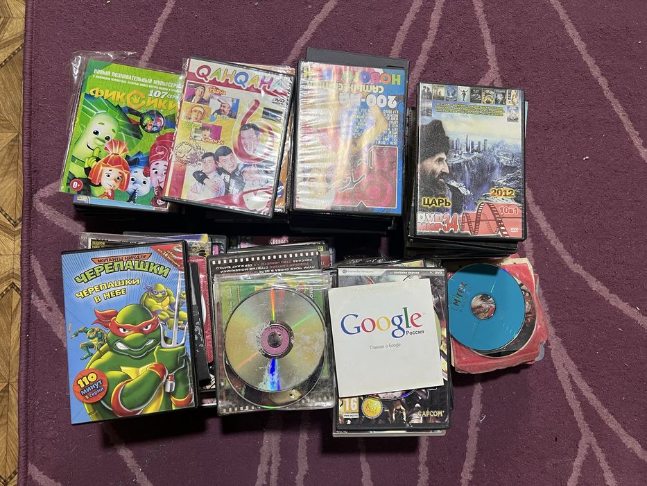 DVD диски, огромная куча