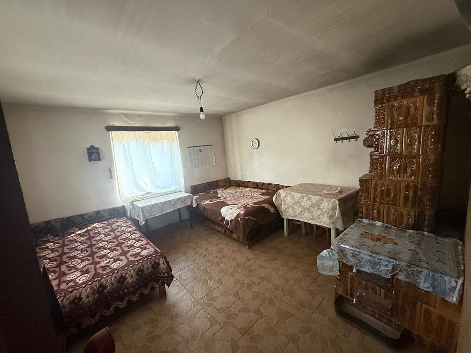 Vând casă în Comuna Giubega